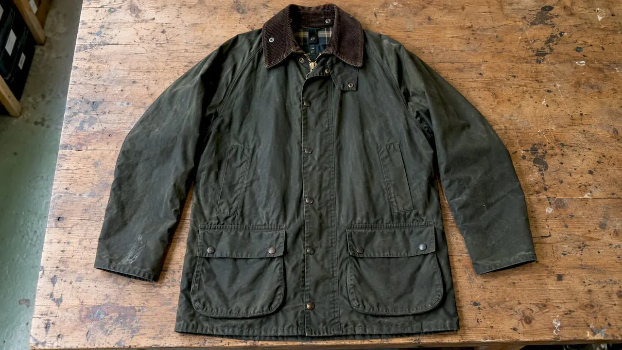Green waxed jacket with a faint cuff mark
