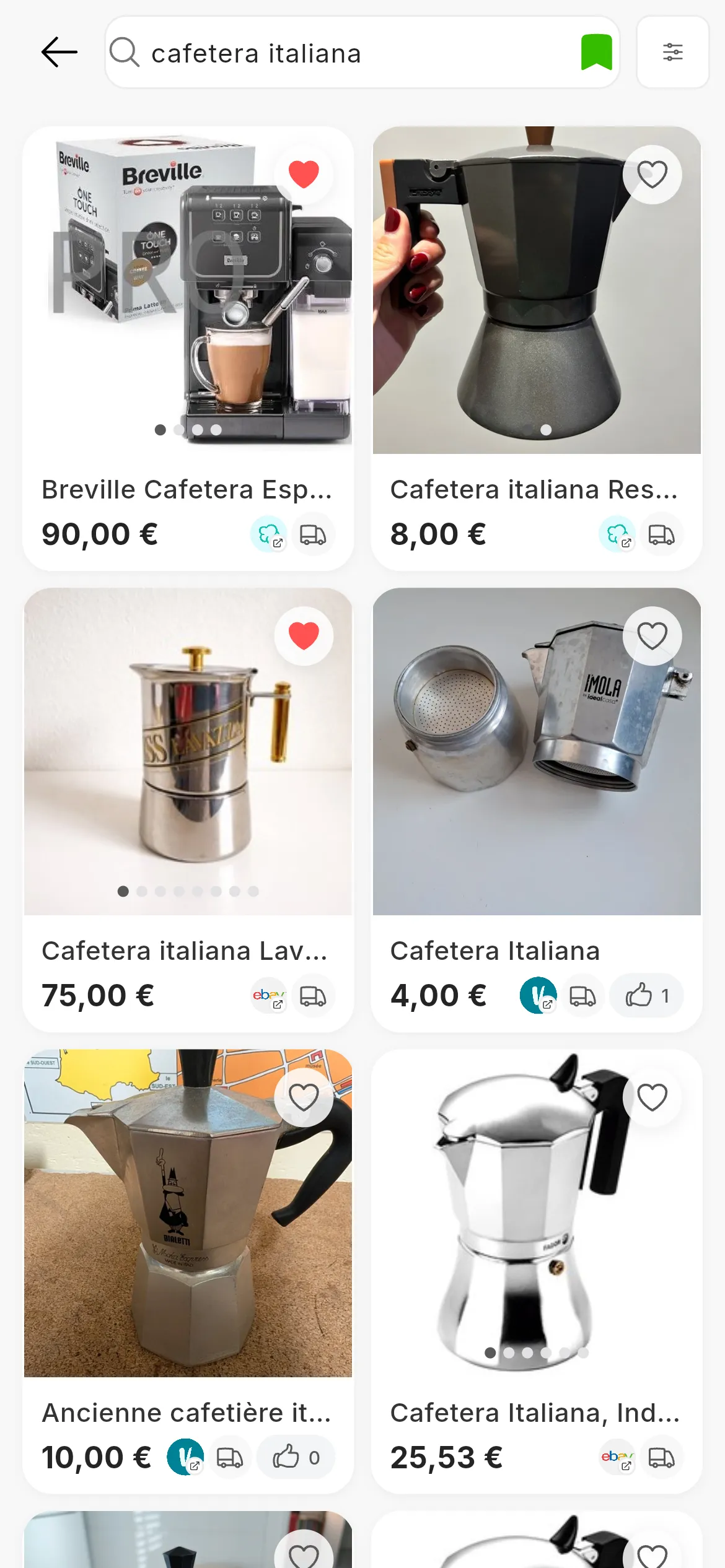 Il motore di ricerca di RUIT con la ricerca cafetera italiana: in alto, Filtri, Ordina per, il campo, Cerca e Ricerca salvata; sotto, una griglia di caffettiere di Wallapop, Vinted ed eBay, ognuna con le sue foto, il titolo, il prezzo, il logo del suo marketplace e il cuore