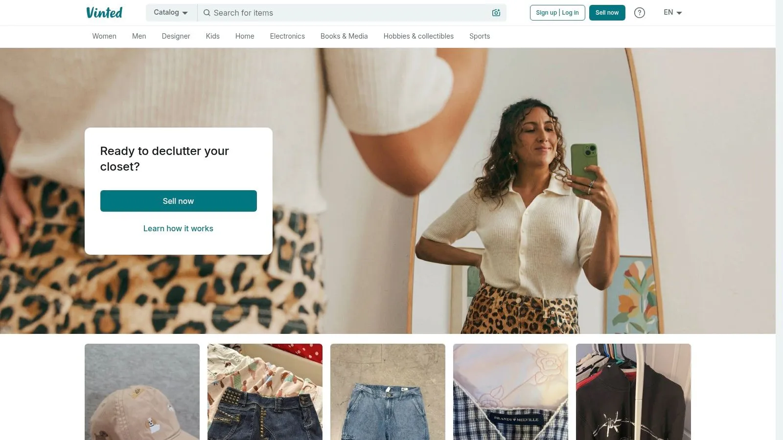A second-hand clothing marketplace homepage with listings for jackets, denim and kidswear