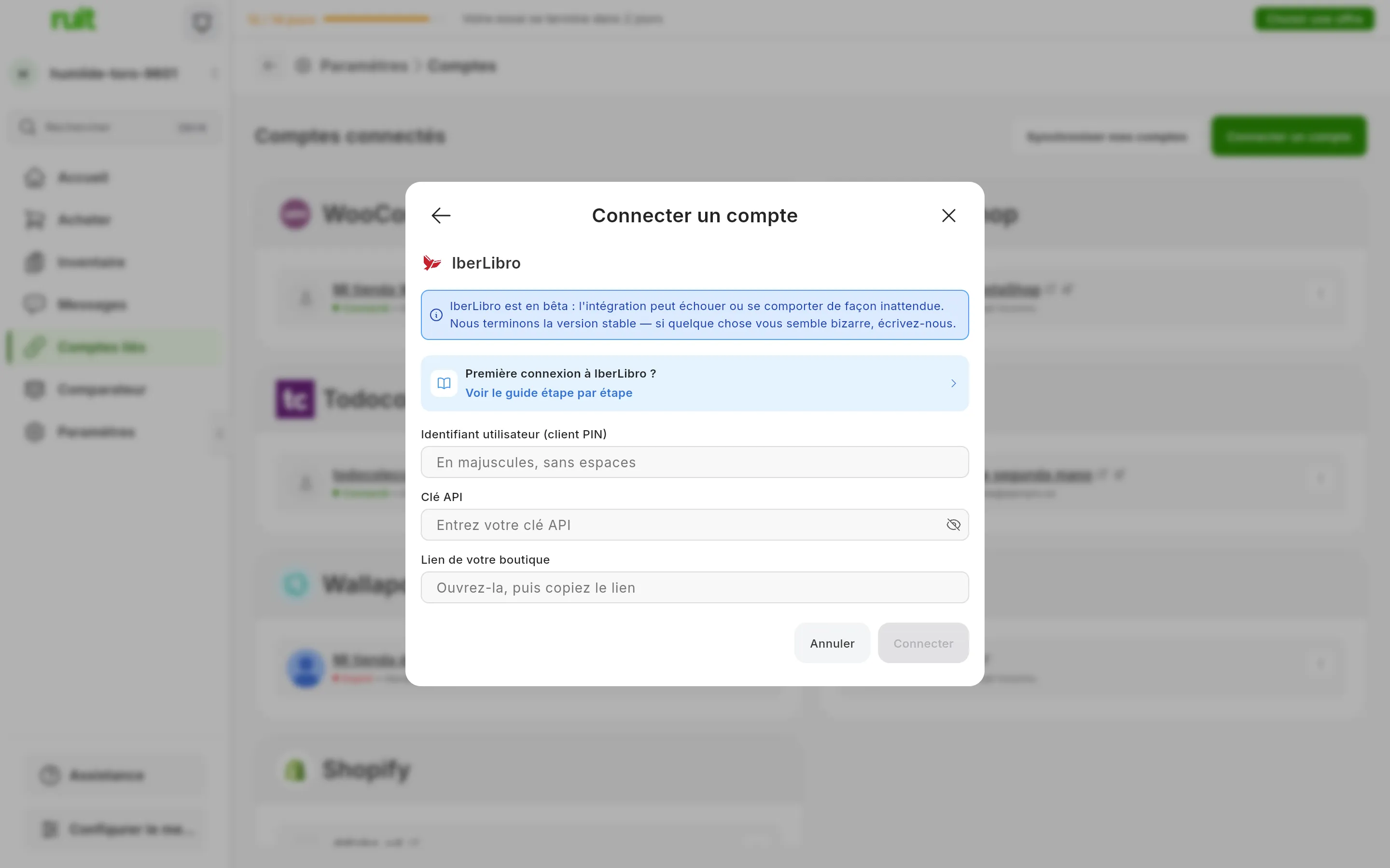 La fenêtre de connexion à IberLibro dans RUIT : l'avertissement indiquant qu'IberLibro est en bêta, le lien vers ce guide, les champs de l'identifiant utilisateur, de la clé API et du lien de la boutique, et les boutons pour annuler et connecter