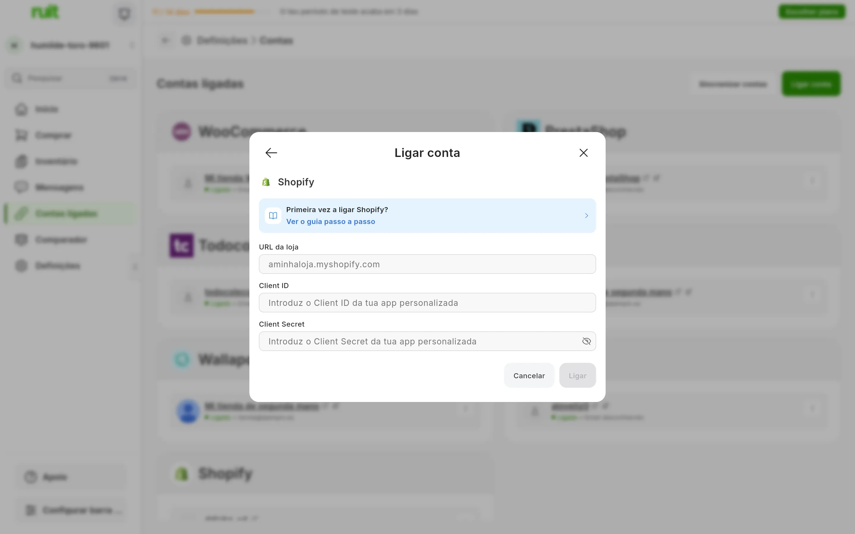 A janela de ligar o Shopify no RUIT: o atalho para este guia, os campos do URL da loja, do identificador e do segredo da app, e os botões de cancelar e ligar